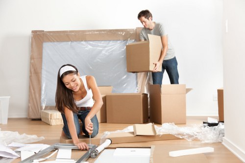 Removal team helping with a house move in Morden