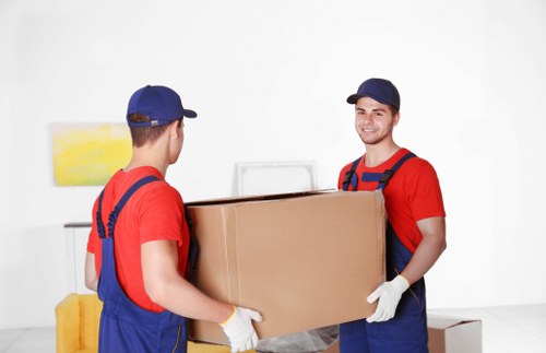 Van loading recyclable household items with careful sorting for reuse and recycling