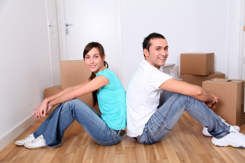 Local moving van loading boxes and furniture for a Morden relocation