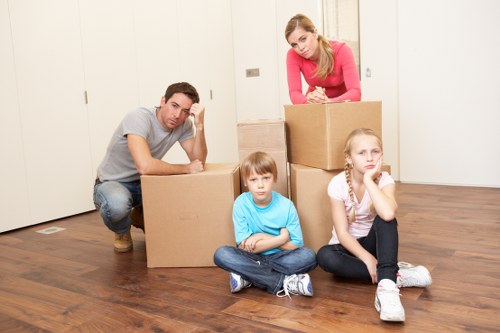 Packed boxes and furniture ready for removals service