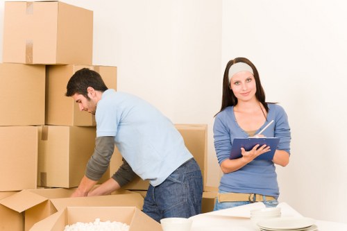 Professional removal team handling household items in Morden